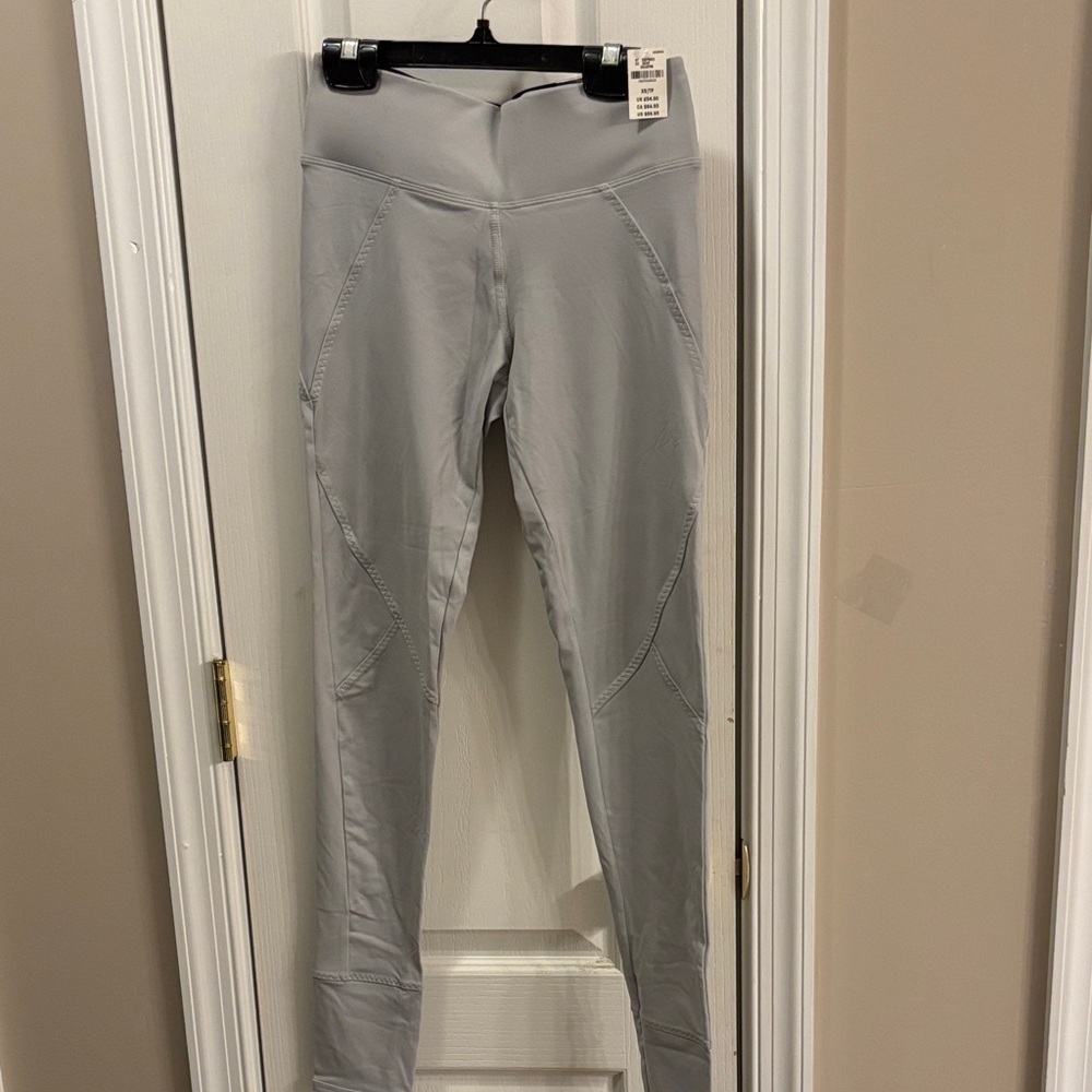 NWT. Pink by Victoria’s Secret ultimate legging silver size extra small.